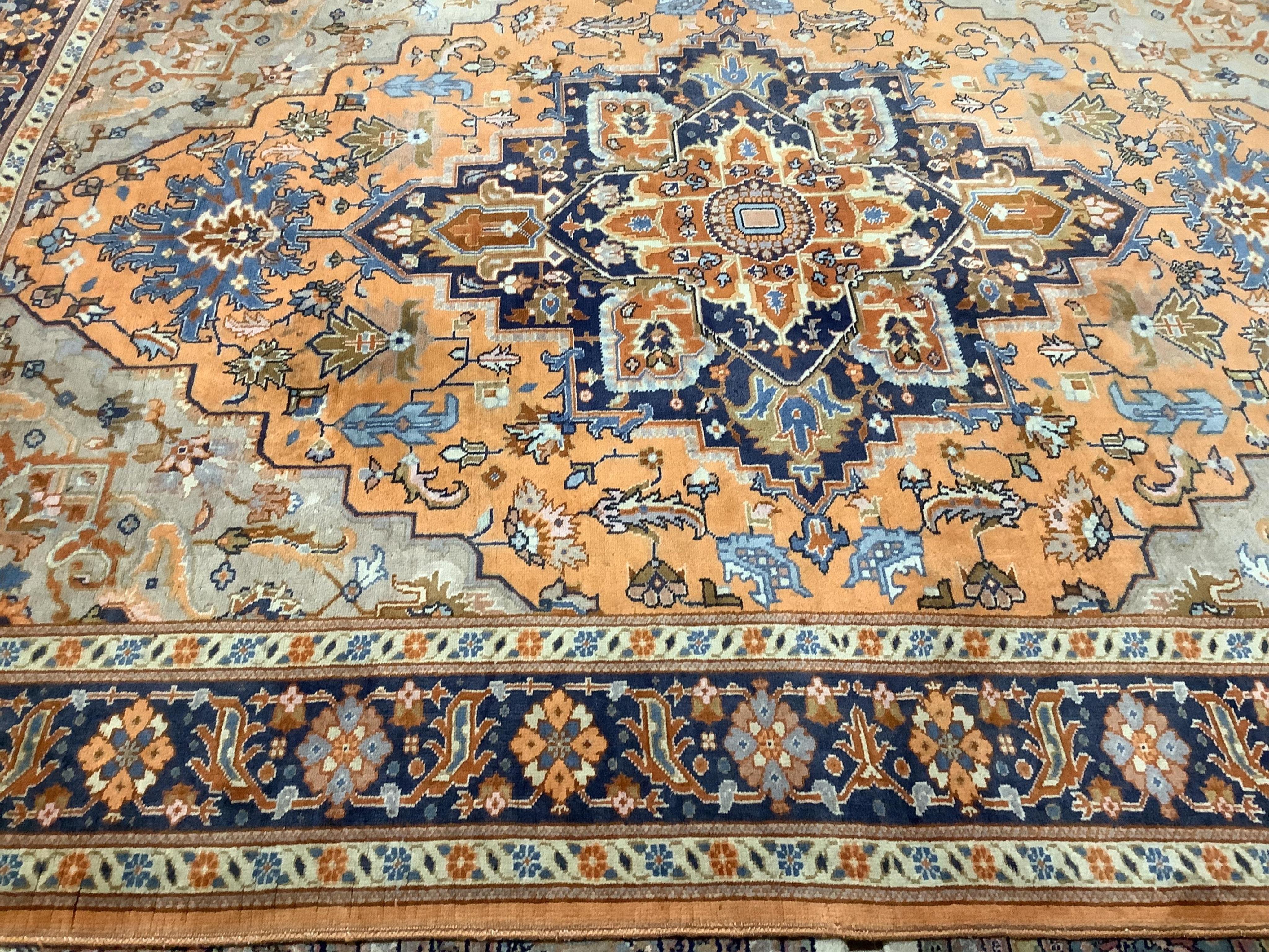 A North West Persian peach ground carpet, 270 x 204cm. Condition - fair